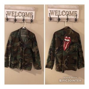 Super cute Army jacket with Rolling Stones logo.